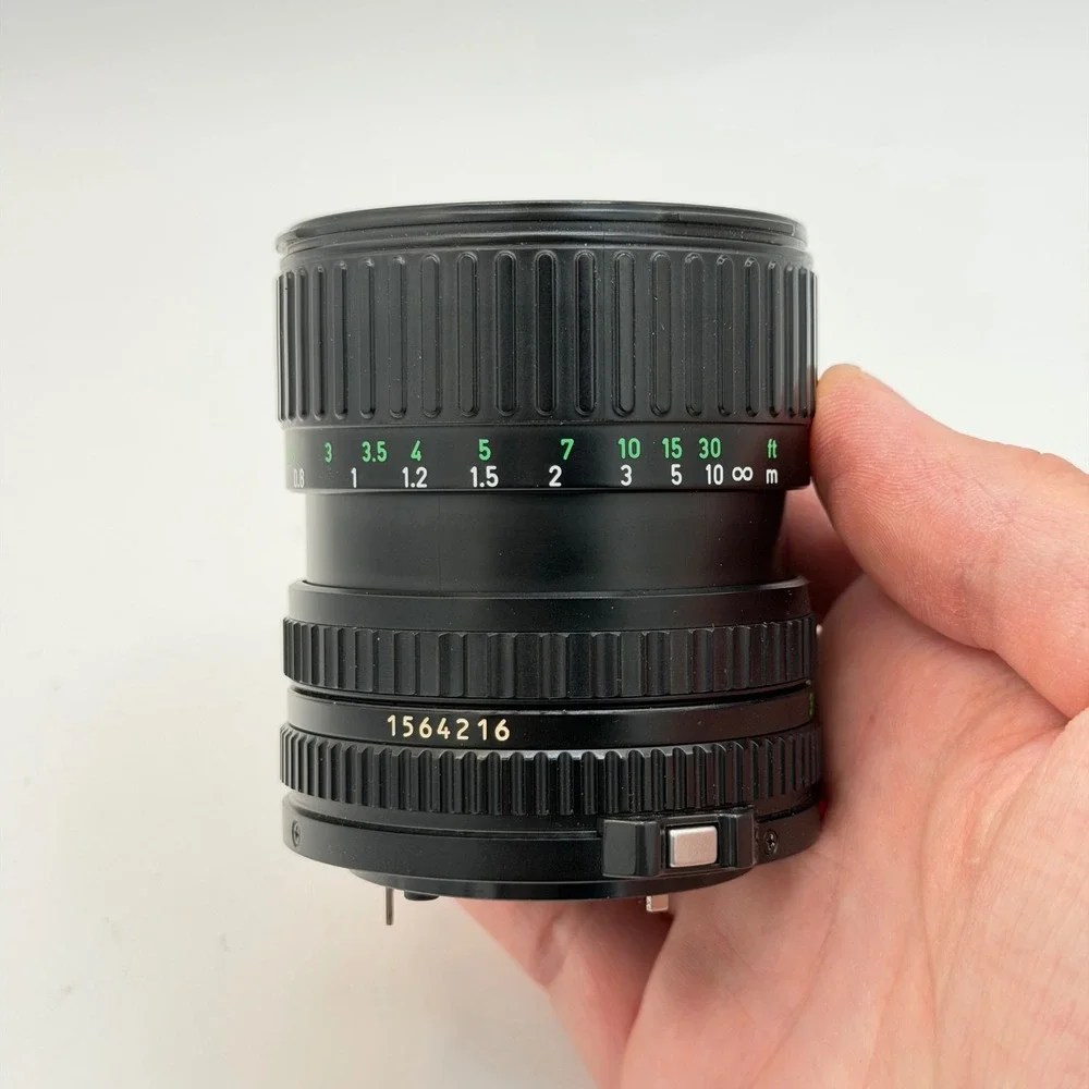 Canon Zoom Lens FD 35-70mm 1:3.5-4.5 Macro Film Camera Lens W/ Tiffen UV Filter